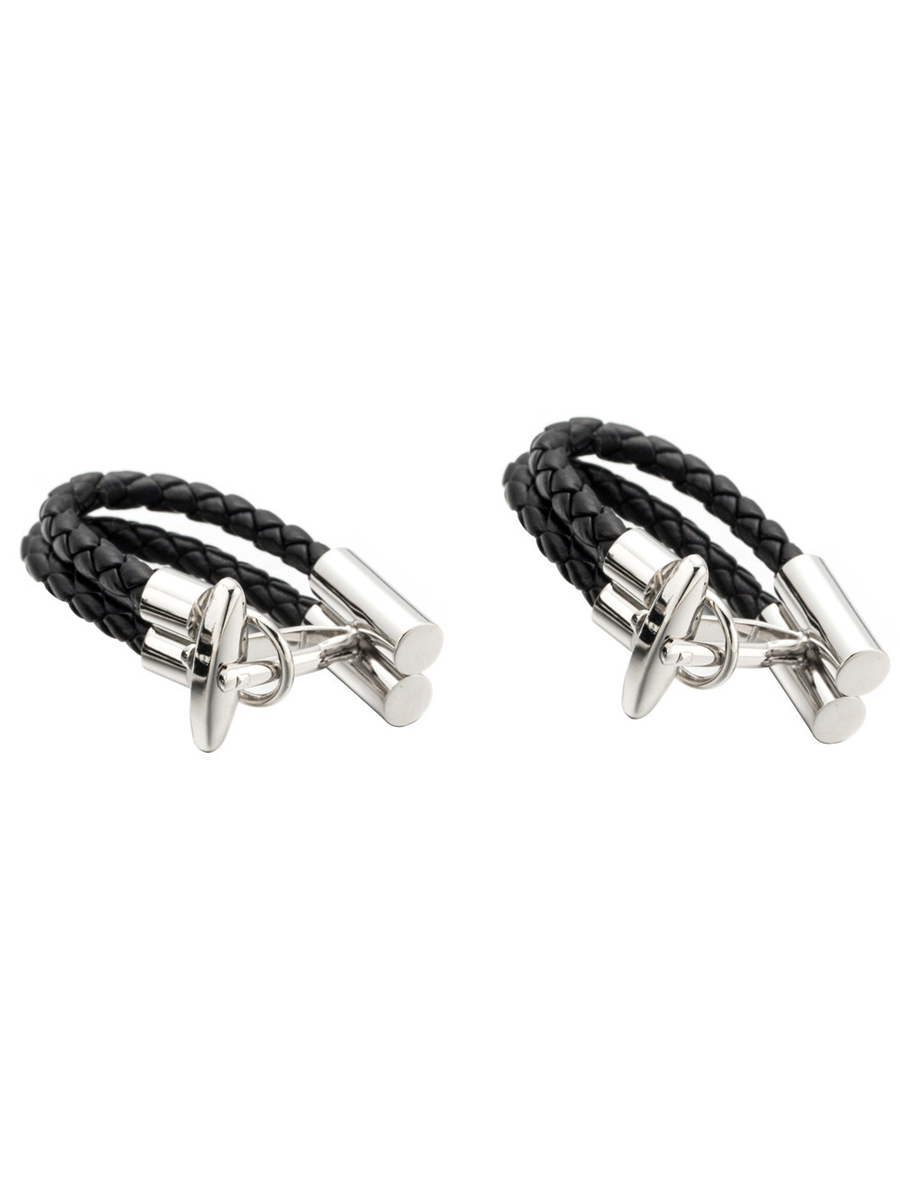 Запонки из стали и кожи черные Запонки из стали и кожи черные, Материал: Ювелирная сталь Экокожа, Цвет: Стальной, черный, Размеры: стальные цилиндры 16.5 мм х 6 мм, внутренний диаметр 8 мм, ножка 19 мм, общие размеры 24.6 мм х 12 мм х 33 мм, общая длина в разложенном виде 75 мм, вес: 14 гр., подарочная упаковка бесплатно.